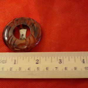 Apple juice bakelite dress clip